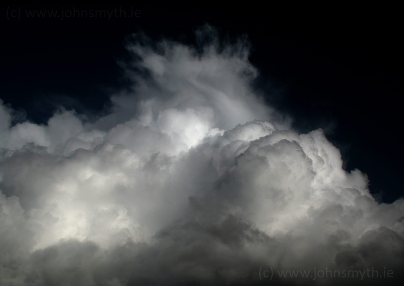 Rain cloud rises over Glencar mountain in Co. Leitrim