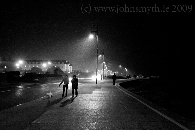 snow falling on the prom in galway